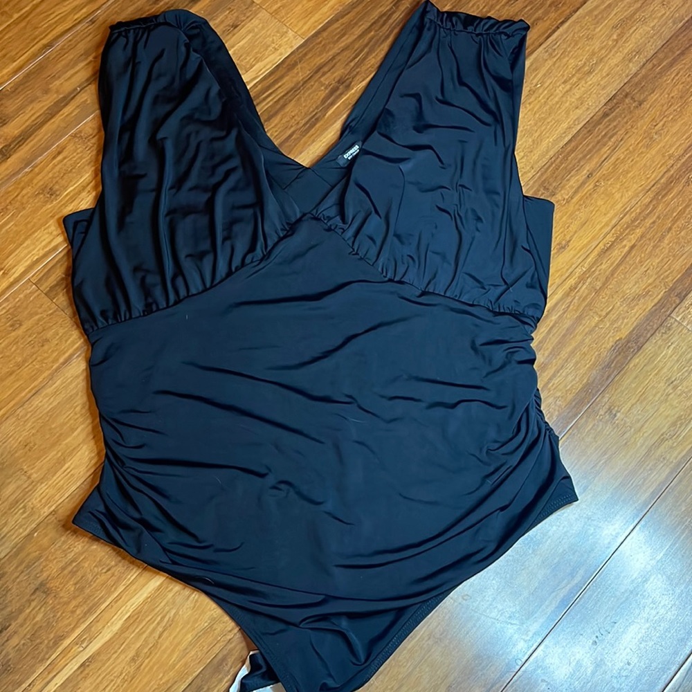 NWT. Express black body suit. Size XL